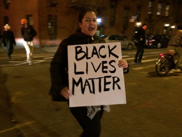 woman protestor "Black Lives Matter"